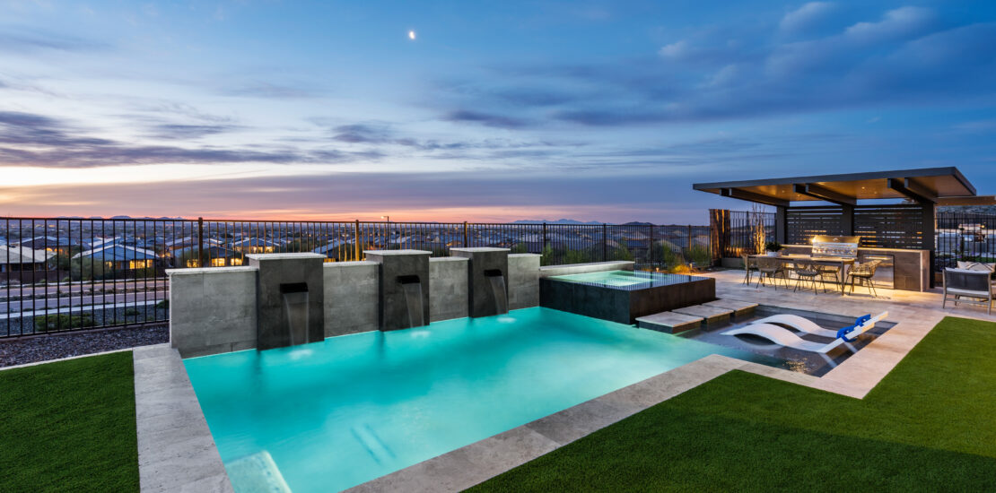 Beautiful pool featuring three waterfall scuppers, showcasing Kevens Landscape Rule of Three design principle